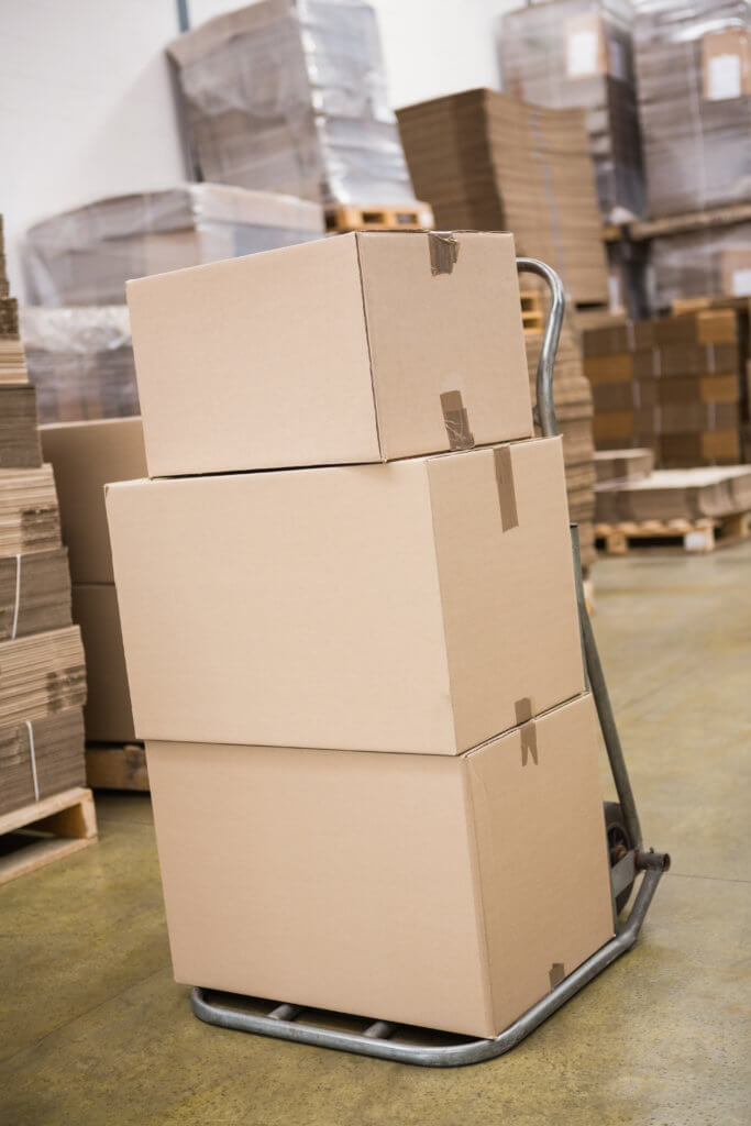 Boxes on trolley in a storage facility