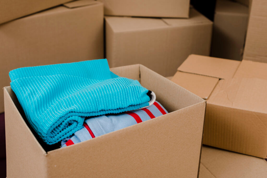 Winter clothes in the boxes in the self-storage