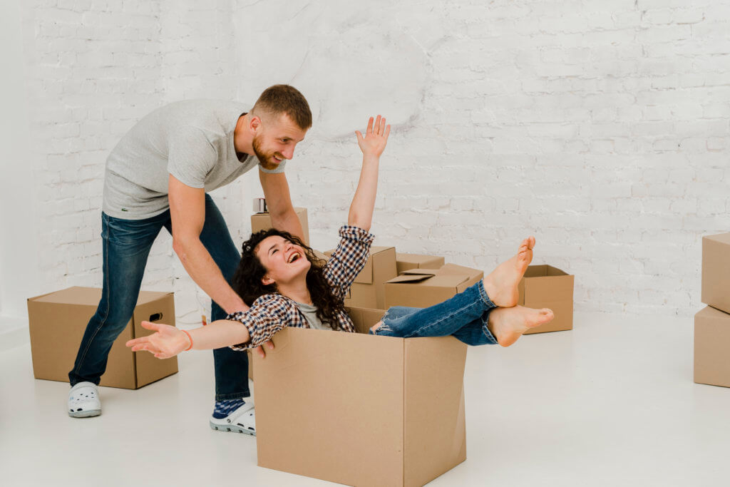 A couple moving out from their house